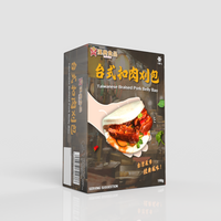 Light gray background Taiwanese braised pork bun box with an image of a pork bun along with Chinese text and design elements indicating spiciness and highlighted.