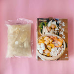 Packaged Pickled Cabbage Hot Pot with Pork is displayed from two perspectives, highlighting the packaging and serving suggestion images for the soup, which includes shrimp, pork, mushrooms and vegetables.
