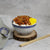 Han Dian Taiwanese Braised Minced Pork Rice with Mushroom, pickled radish, chopsticks, and spoon.