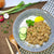 Han Dian Fried Shallot Minced Chicken Rice with cucumber, radish, yellow pickles, and fried shallots, served with chopsticks and spoon.
